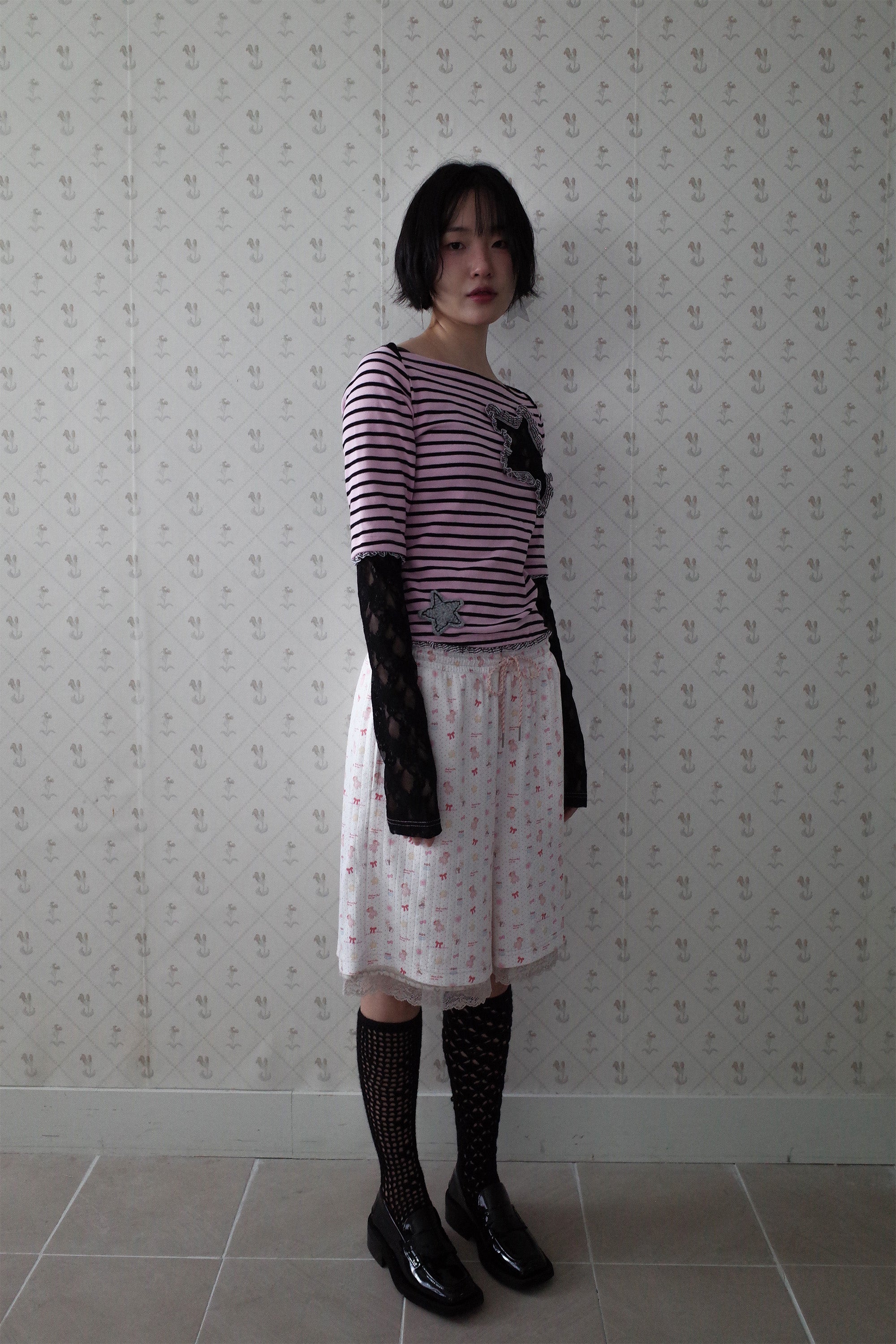 Collaged stripe star top black